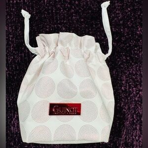 A gift bag with drawstrings from the cosmetics brand Guinot (France)
